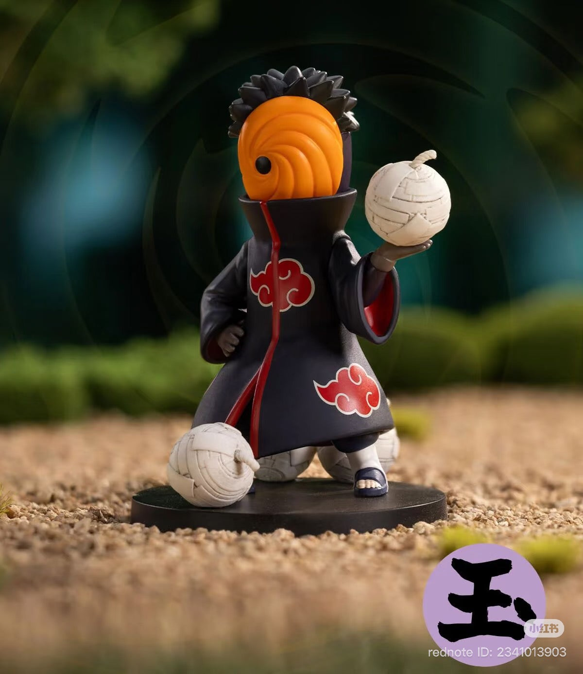 Naruto: Shippuden Series Battle Against Akatsuki Themed Figure depicting Tobi with Akatsuki cloak, orange mask, and Truth-Seeking Balls, on a gravel base.