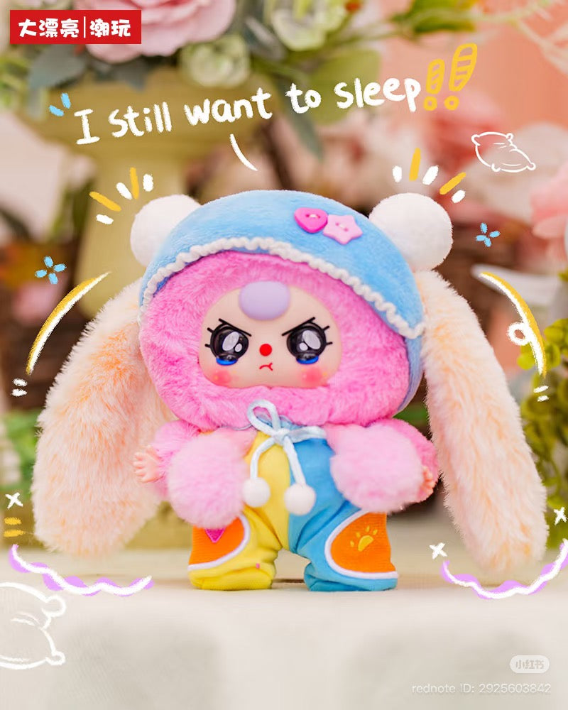 Baby Three - Sweet Dreams Plush Blind Box: A collectible toy in a fluffy bunny outfit with cartoon eyes and playful doodles, exuding a whimsical, sleepy vibe.