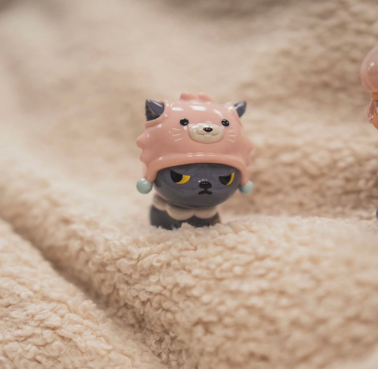 Poh x Morimei works Soft Vinyl Set 2 figurine: a grumpy grey cat in a pink hat, displayed on a soft surface. Preorder for January 2026.