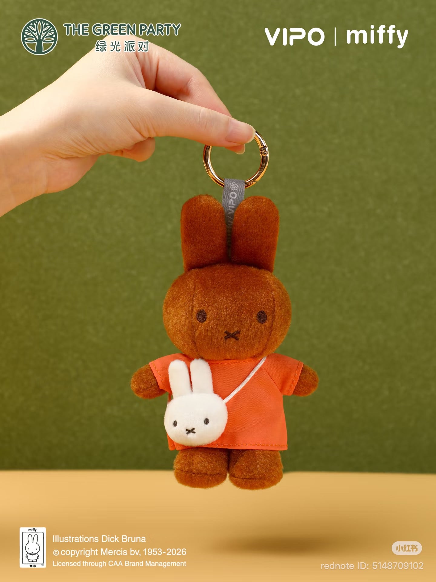 Miffy Travel Outing Series Blind Box Pendant featuring Miffy in an orange dress with a bunny purse, attached to a gold-tone key ring.
