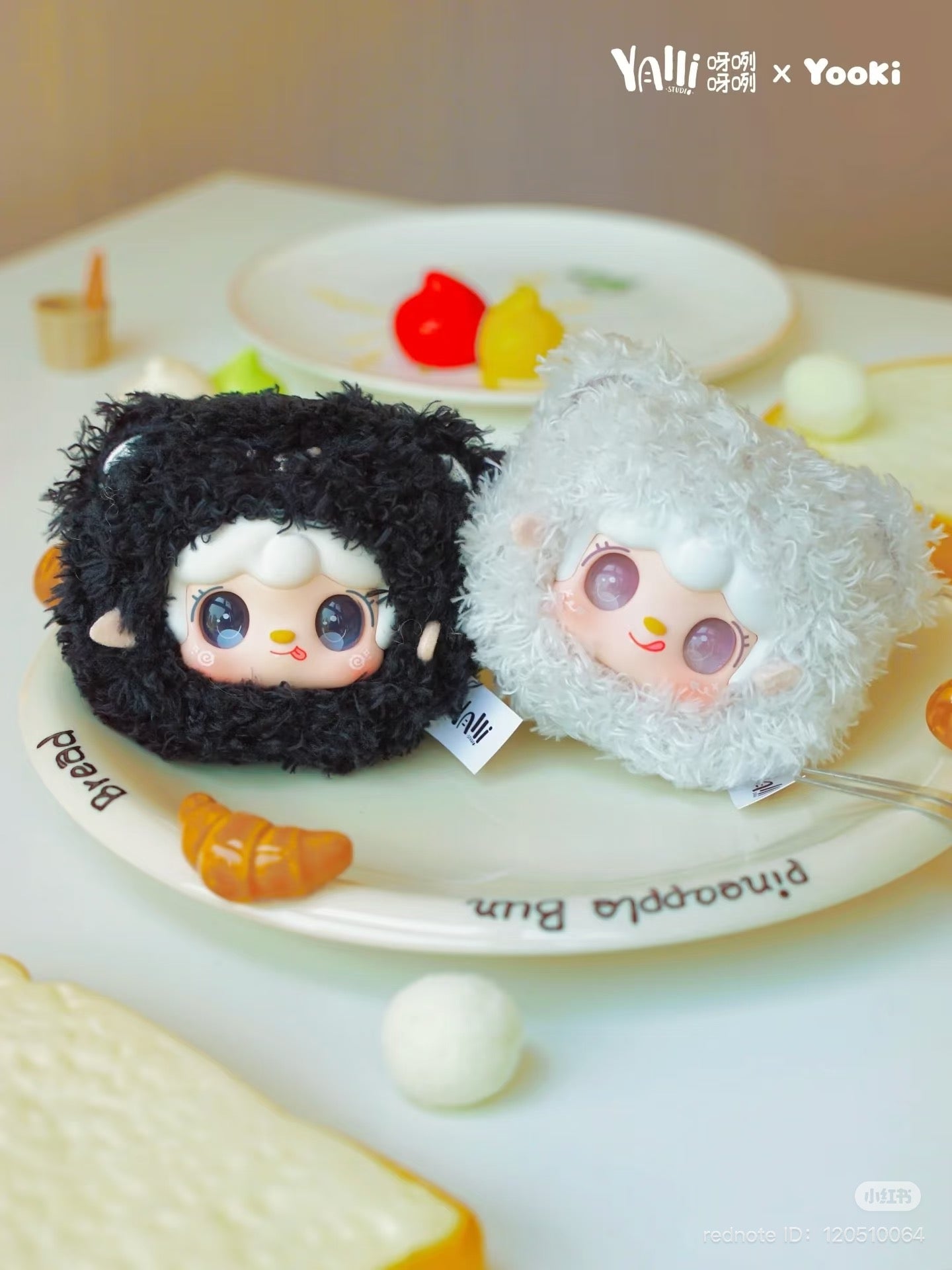 Yooki - Little Bear Bun Mini Keychain Plush Blind Box on a plate, part of a preorder series featuring 8 designs and 2 secret options.