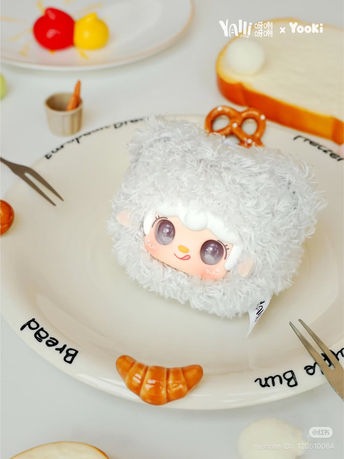 Yooki - Little Bear Bun Mini Keychain Plush on a plate, part of a preorder series from Strangecat Toys, featuring 8 regular and 2 secret designs.