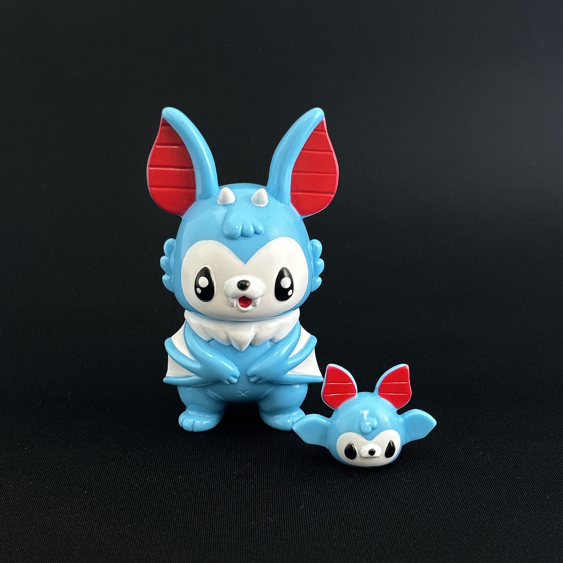Sofubi toy of Bat Monster - Fancy Blue by Chishima Konosuke, a cute animal figure with a cartoonish design.