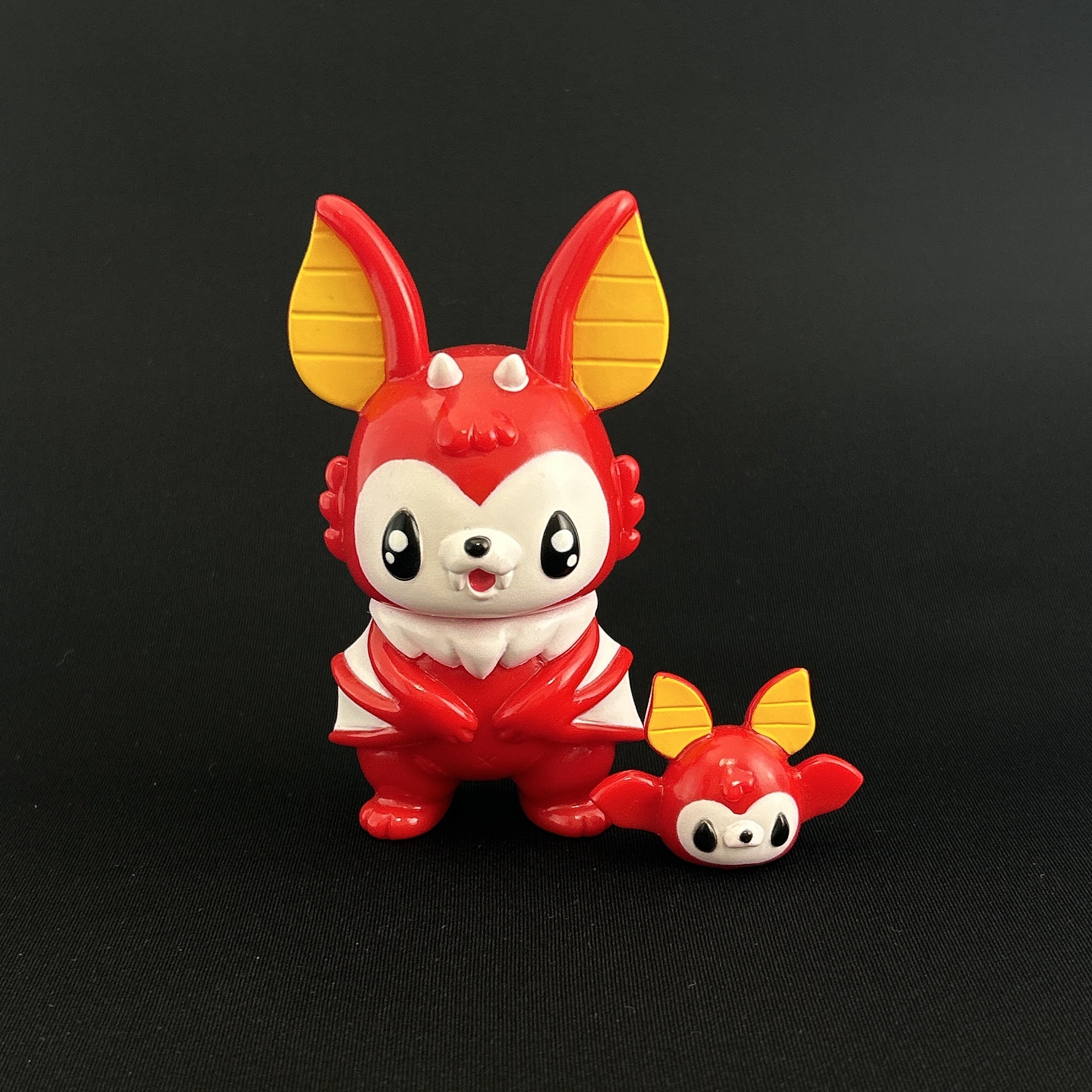 Sofubi toy of Bat Monster - Fancy Red, a cartoon animal figure by Chishima Konosuke.