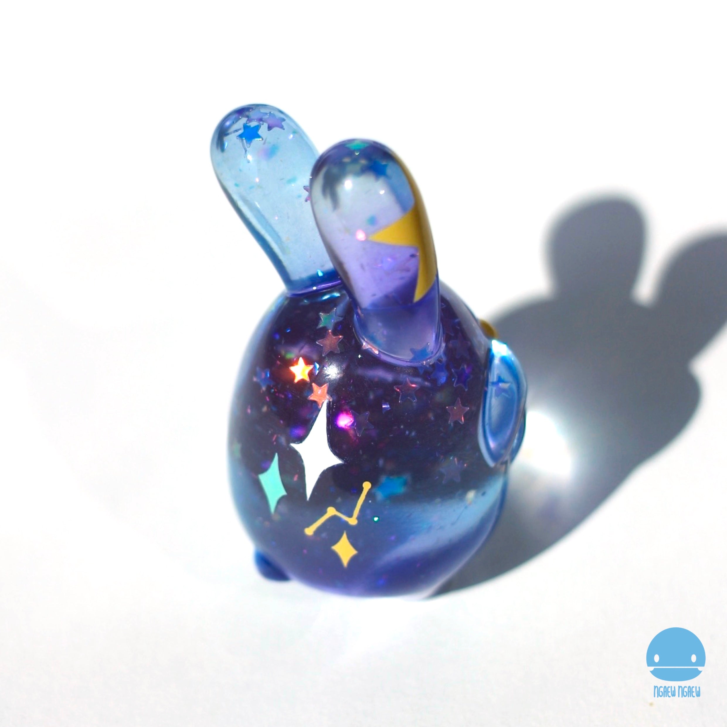 Ngaew Ngaew Shooting Star & Falling Snow resin figure, shaped like a bunny with star details, available for preorder, releases April 2025.