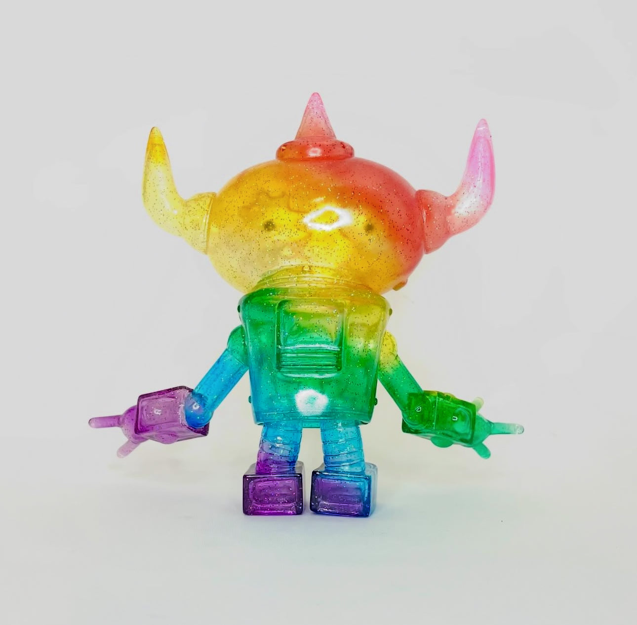 Getchari Robo Rainbow by OTA Cream x Xhashi, a 17.5 cm sofubi art toy, featured in Strangecat Toys' unique collection.