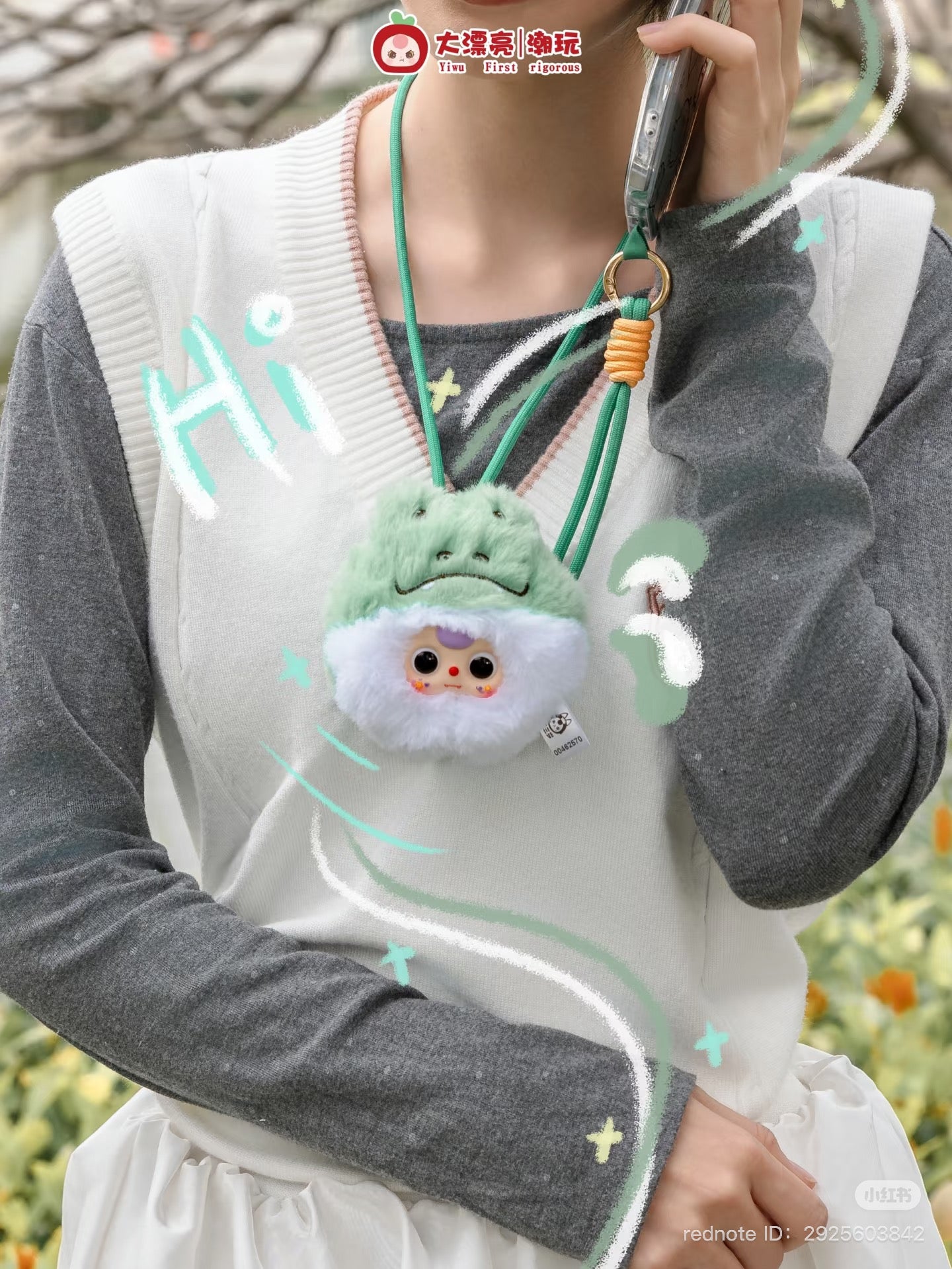 Close-up of Baby Three Mobile phone strap Plush Blind Box, featuring a necklace-like fashion accessory. Preorder for July 2025, includes 12 designs and 1 secret option.