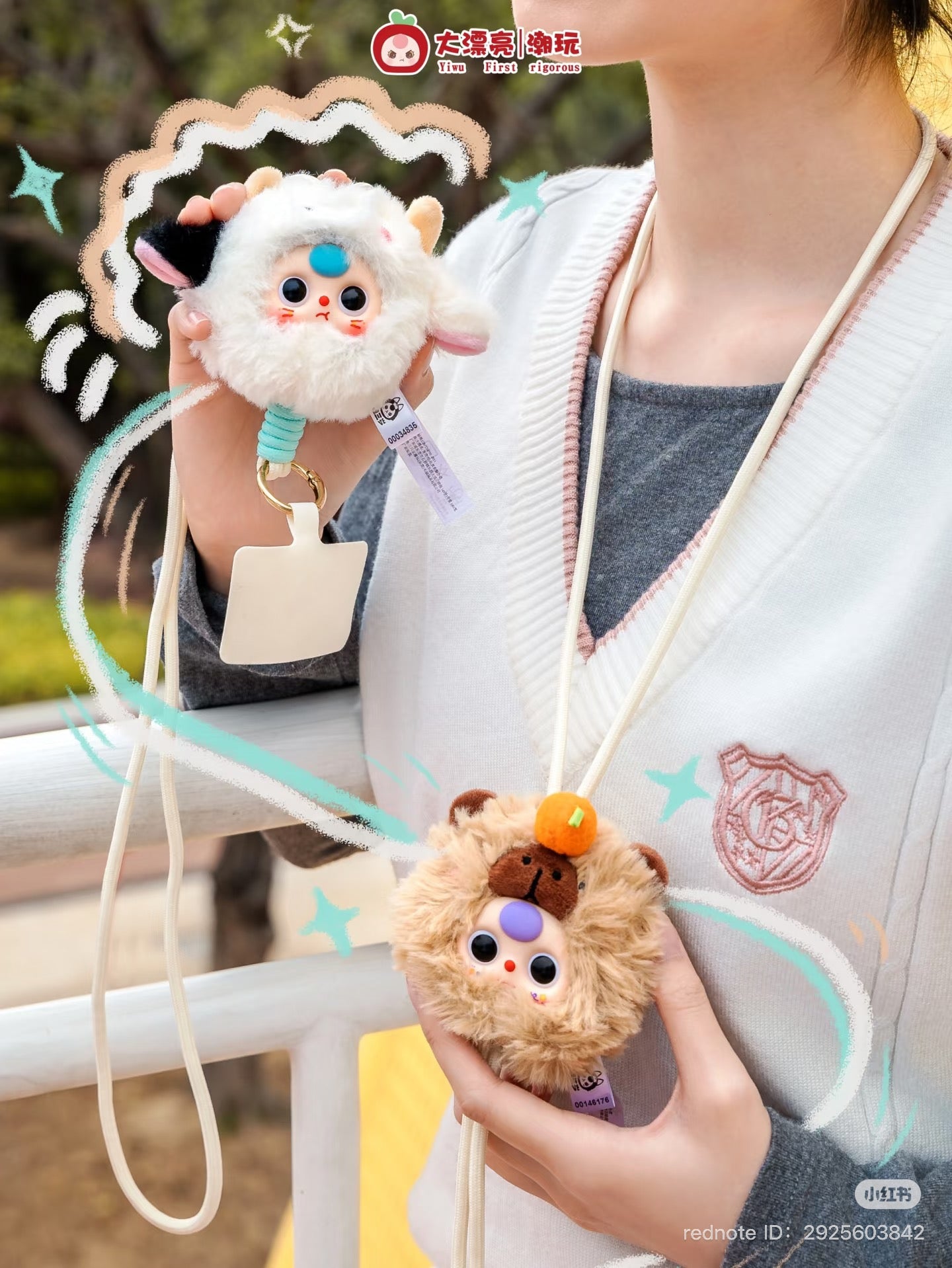 Baby Three Mobile phone strap Plush Blind Box - Preorder; close-up of a hand holding a plush doll, part of a collectible toy series.