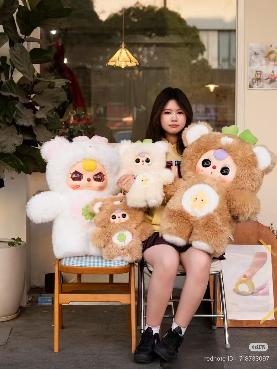 A person holds the BabyThree 1000% Bear Boy +400% Baby Bear Blind Box, showcasing its large size; preorder for late July 2025 delivery.