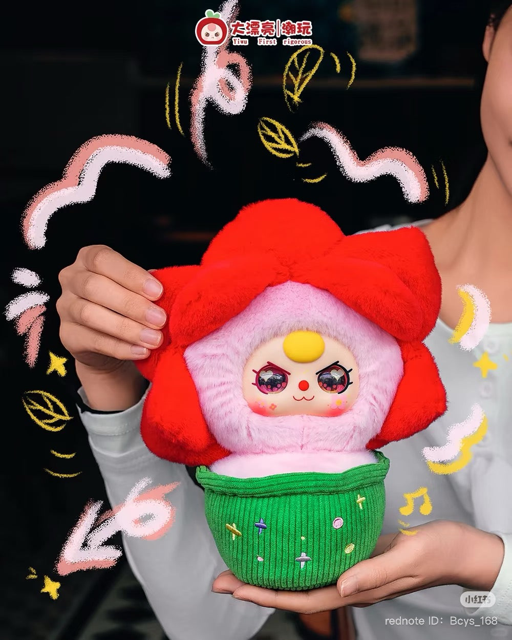 Close-up of a Baby Three Flower Pot Plush Keychain Blind Box, featuring a hand holding a plush toy, highlighting preorder availability for July 2025.