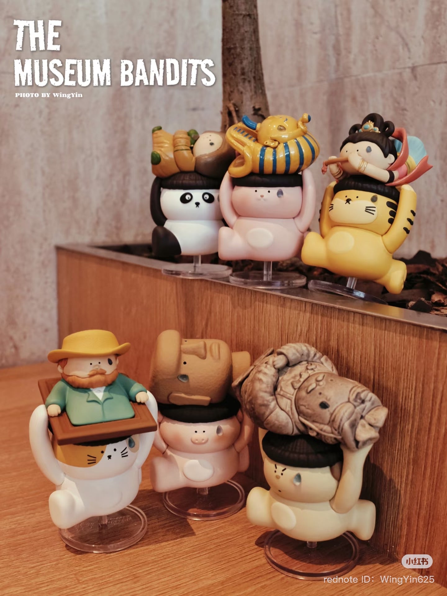Museum Thief Series Blind Box - Preorder: Display of toy figurines, including a pig and man on desk, part of a collectible set of six with one secret.