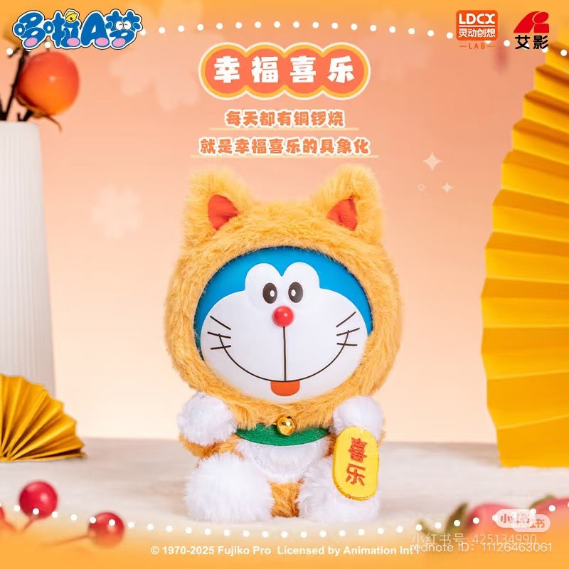 Doraemon-vol.1 Lucky Cat Plush Blind Box showing a close-up of the cartoon-style stuffed animal, available for preorder, ships August 2025.