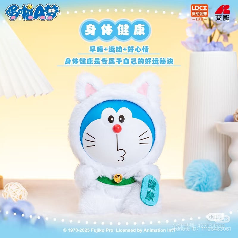 Doraemon-vol.1 Lucky Cat Plush Blind Box featuring close-up of toy and snowman design, available for preorder, ships August 2025 from Strangecat Toys.