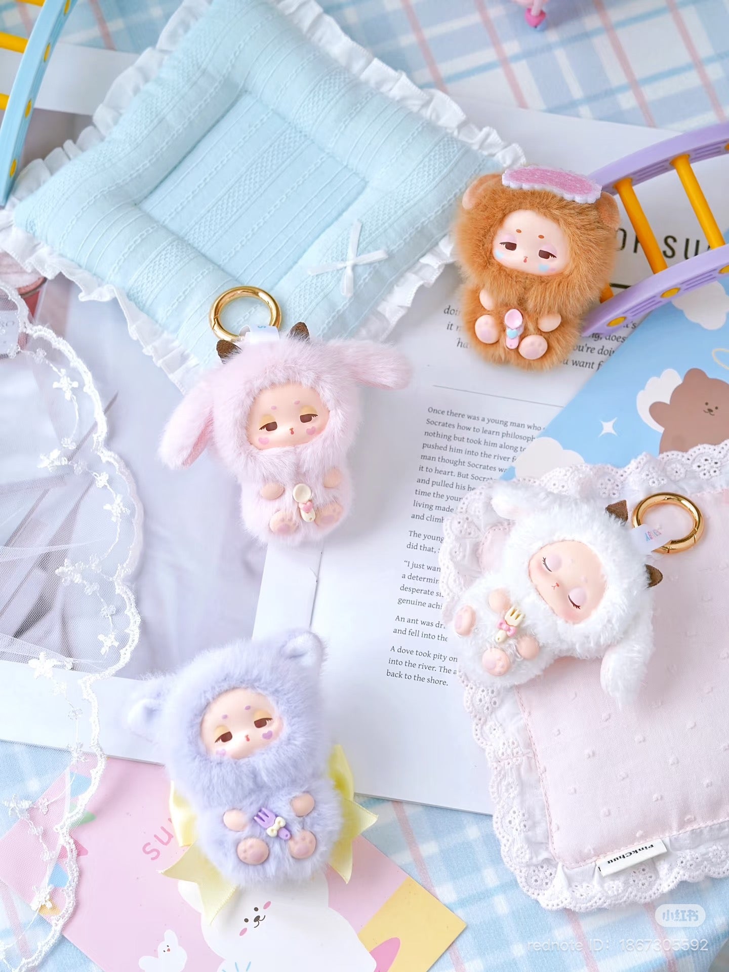 Close-up of a Sleepy Baby series vinyl plush keychain blind box, featuring a fabric teddy bear design, available for preorder.