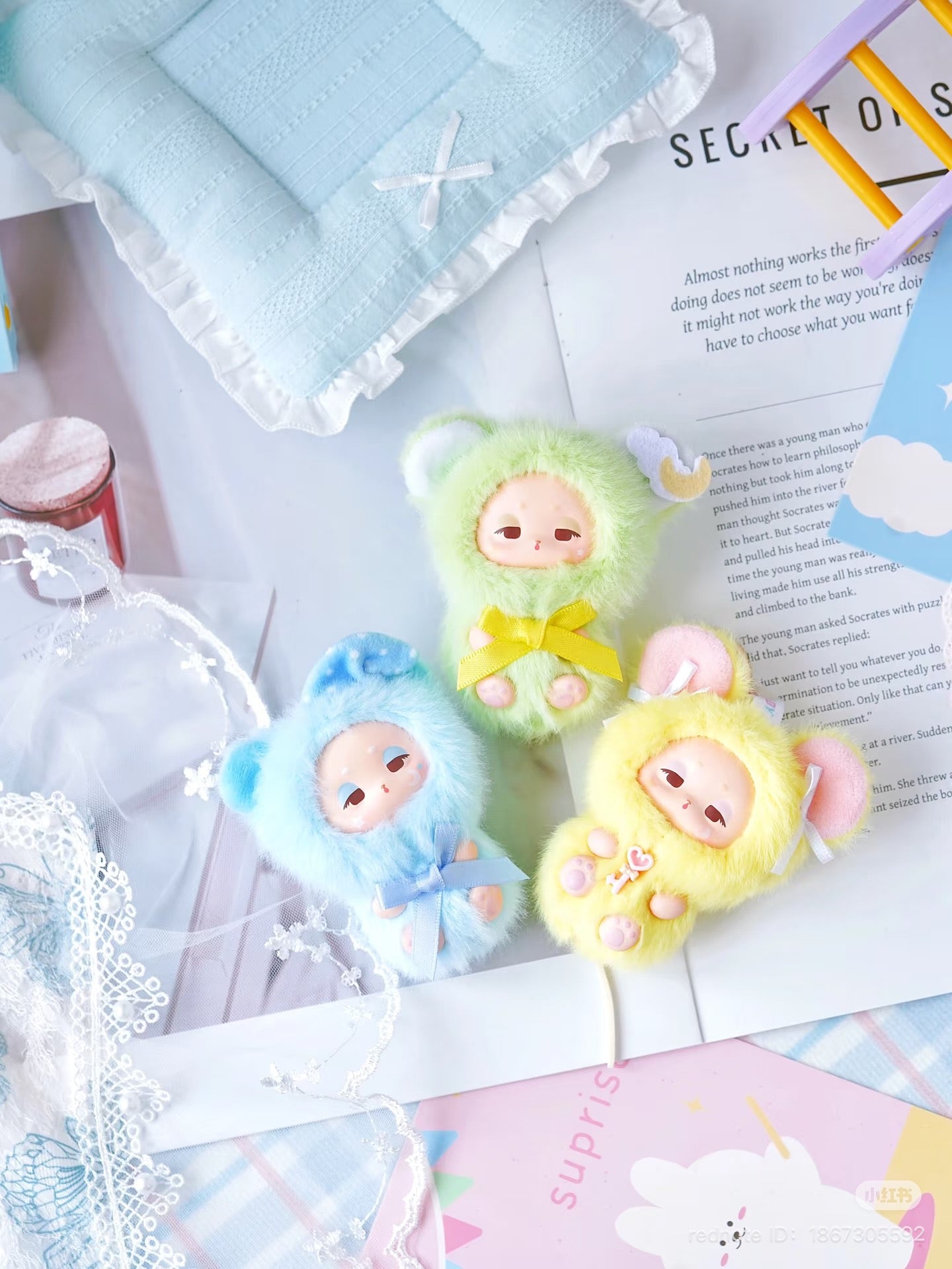 Sleepy Baby series vinyl plush keychain blind box featuring a close-up of whimsical elements like a heart and ladder, highlighting its playful, collectible nature. Preorder available.