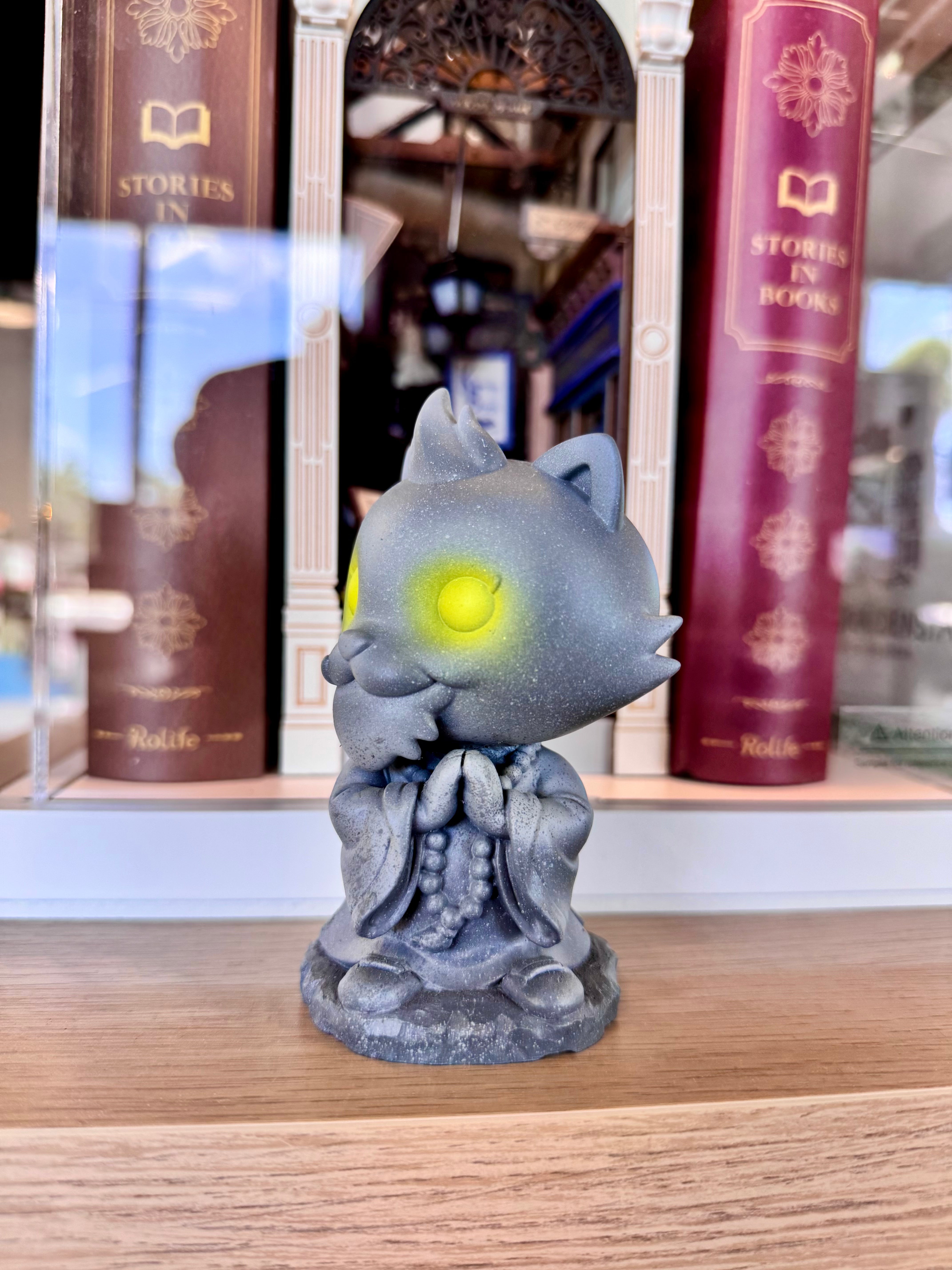 Grandpa & Friends 2 - Wise Grandpa sculpture, a 4 vinyl figure by Czee13, showcased with a book and flower, epitomizing unique art toys.