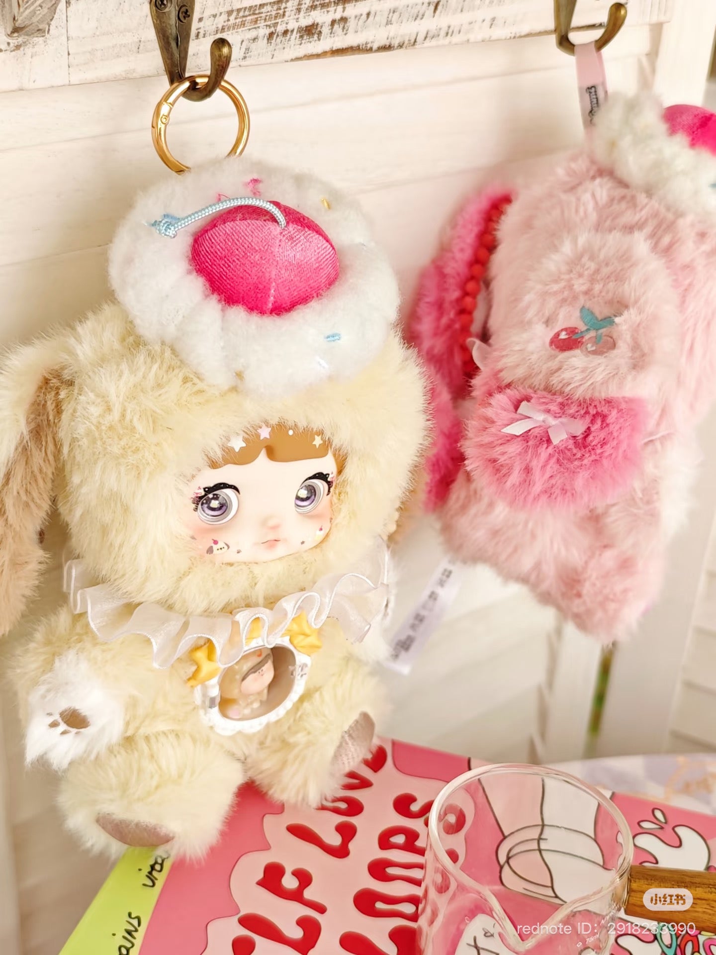 Nommi Eat Sweets Series Plush Keychain Blind Box features a pink plush toy, part of a collectible set with six designs and one secret.