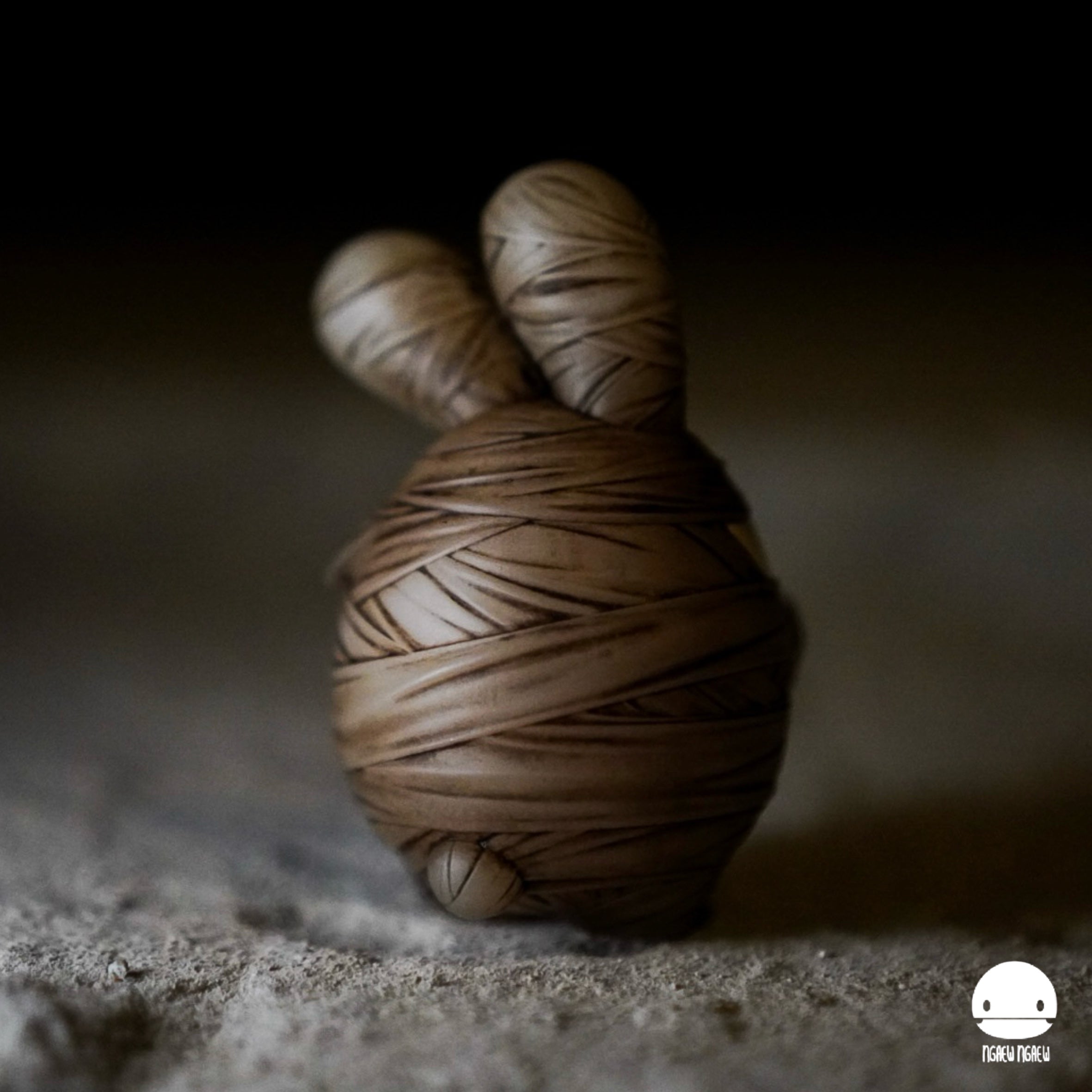 Ngaew Ngaew Mummy by Ngaew: a resin art toy with spiral-wrapped design, featuring bunny ears. Limited edition of 70, 8 cm size.