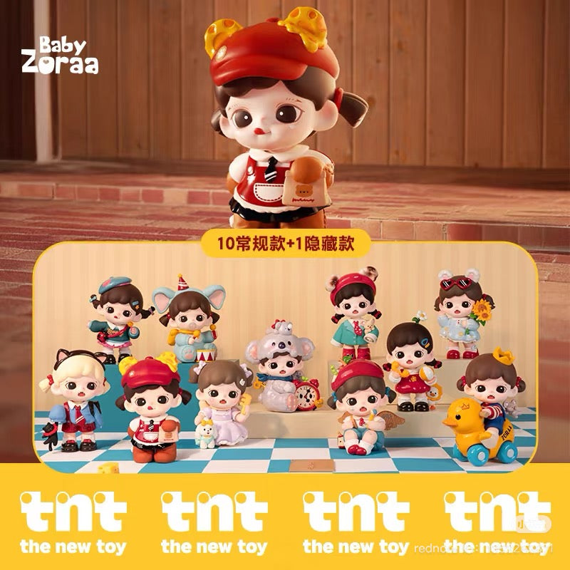 Zoraa Cuteness is Justice Series Figures Blind Box featuring a close-up of a toy figurine girl among a group of small LEGO-style animated cartoon figures.