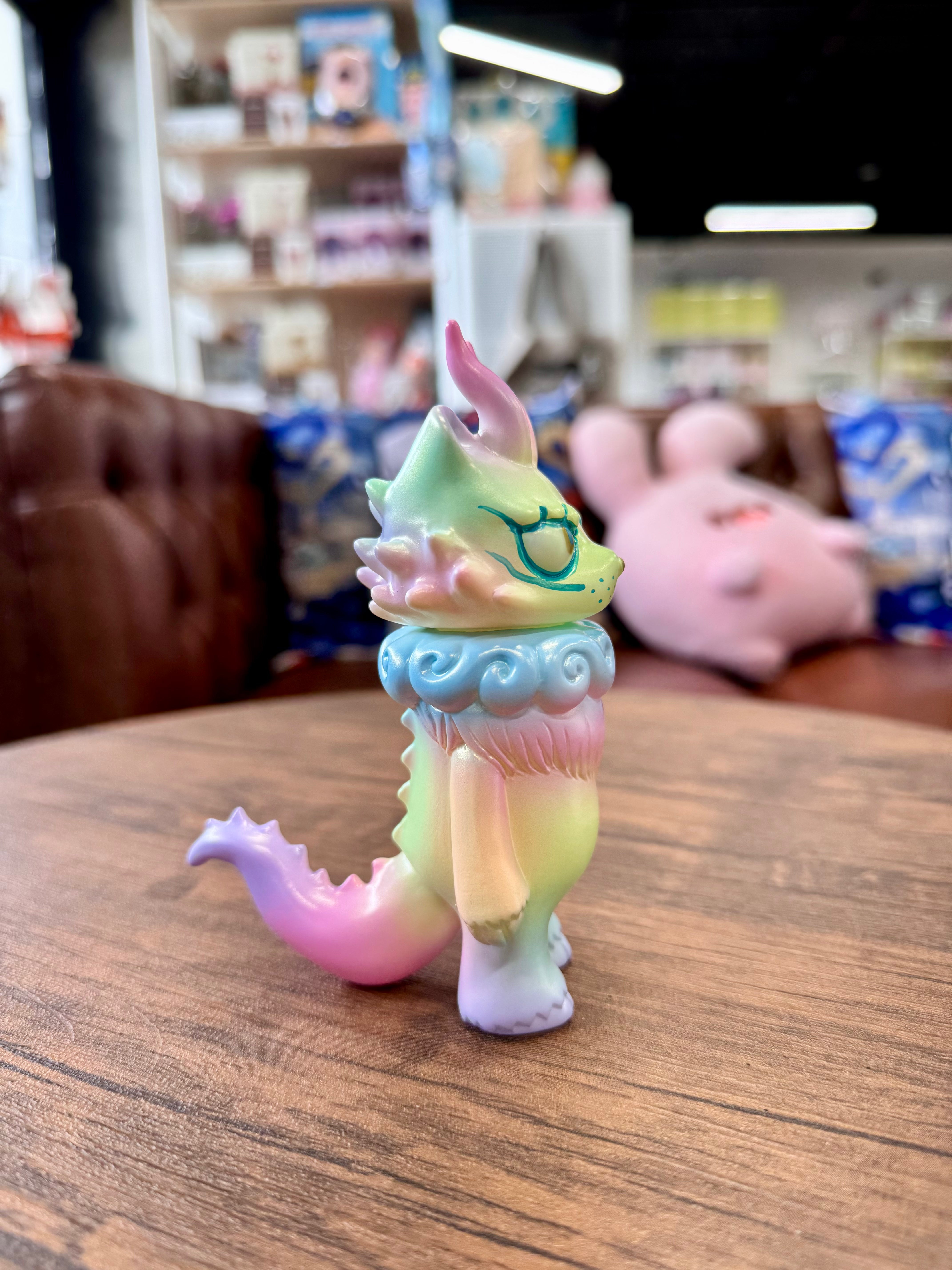 Gekko Dragon Fluorescent Color by YASU, a Japanese Sofubi toy, features intricate cartoon-style detailing of an animal figure, ideal for collectors of unique art toys.