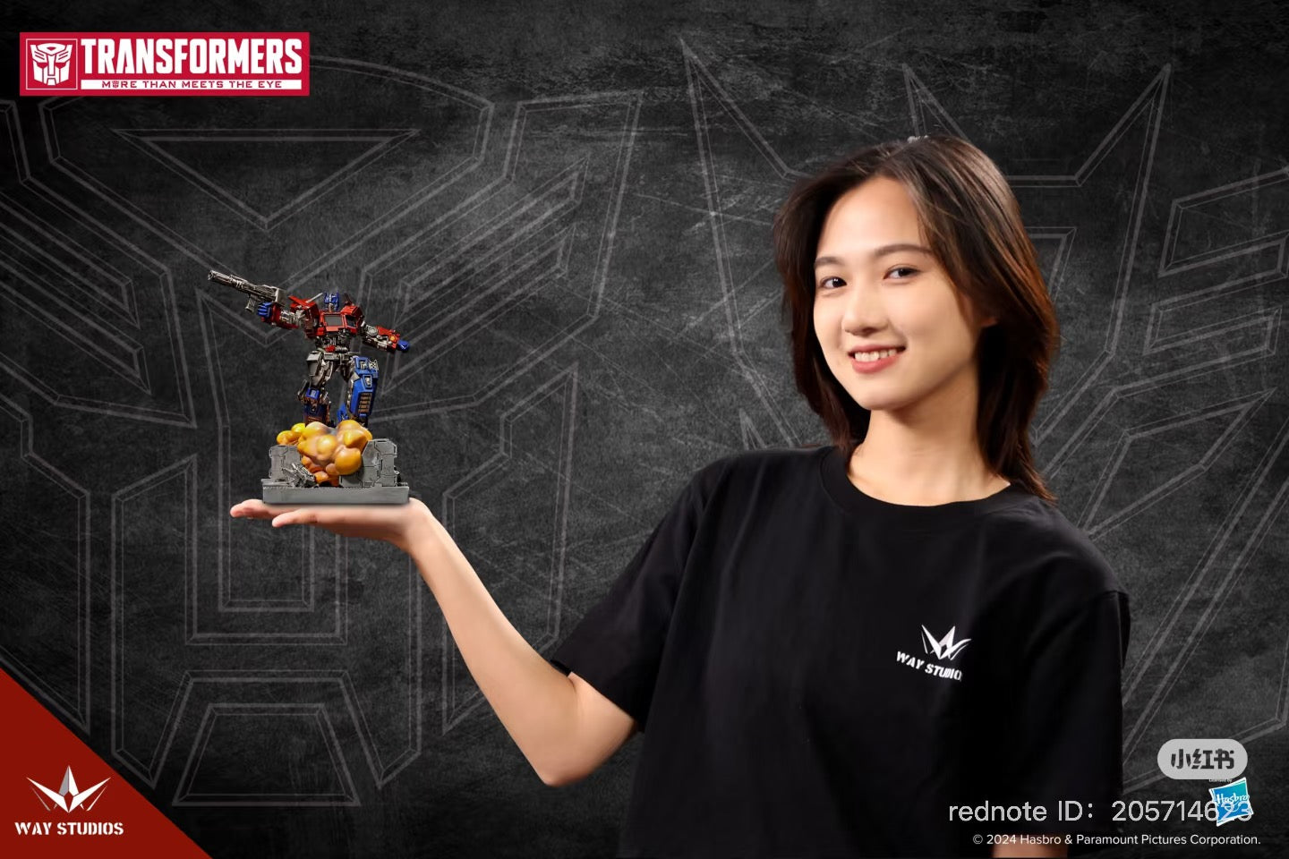 Woman holding a Transformers Series Statue Scene Blind Box toy, part of a collection with 6 designs and 1 secret option, available for preorder.