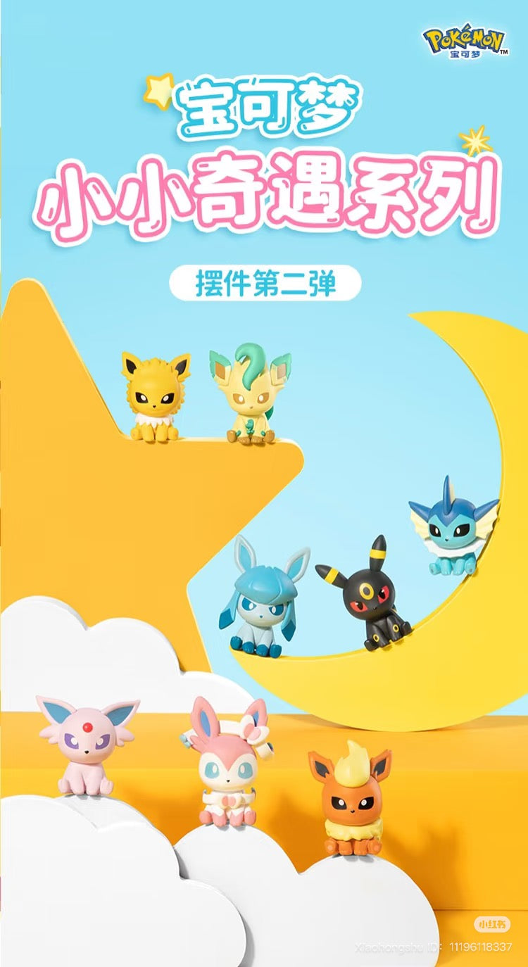 Pokémon Mini Adventure Series 2 Display Figure showcasing a yellow and green toy animal figurine with black ears, part of a 14-design collectible series.
