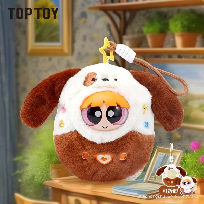 The Powerpuff Girls Arcade Plush Keychain Blind Box - Preorder, featuring a toy collection, displayed with plant blurs in the background.