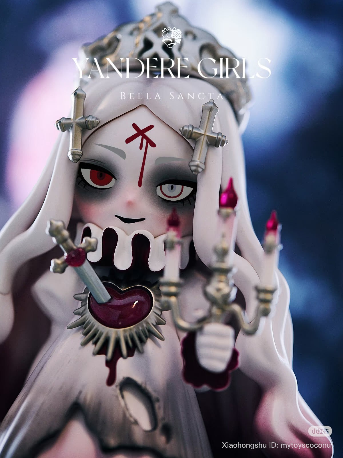 Yandere Girls Bella Sancta vinyl figure in gothic nun attire with red accents, featuring a bleeding heart and candelabra. Available for preorder at Strangecat Toys.