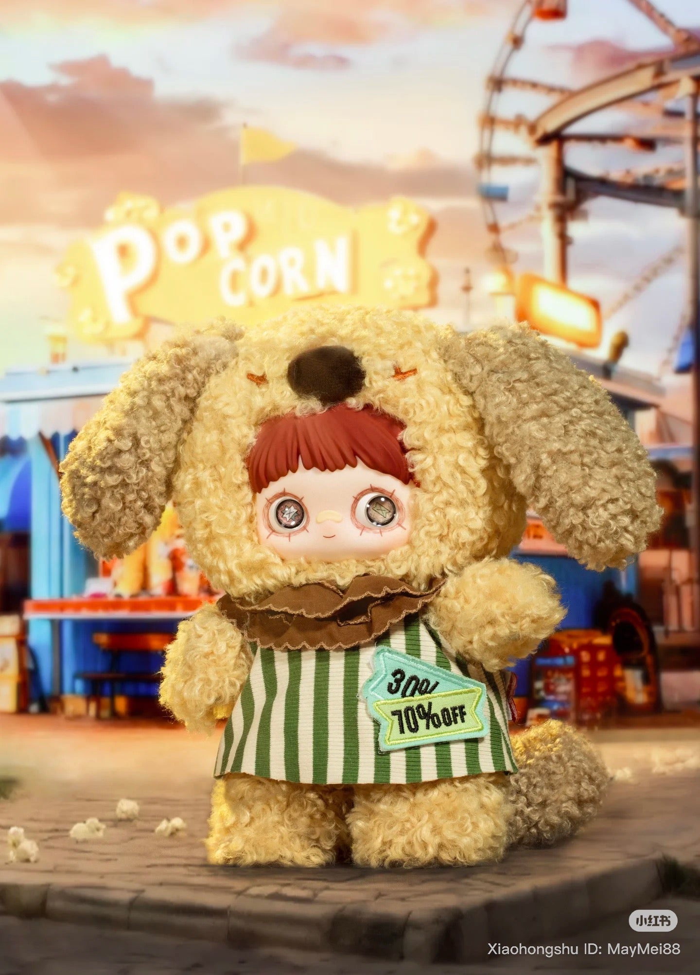 Maymei 400% Forgotten Funfair Plush Keychain Blind Box doll in a teddy-dog costume, standing before a carnival popcorn stand, showcasing its playful design.