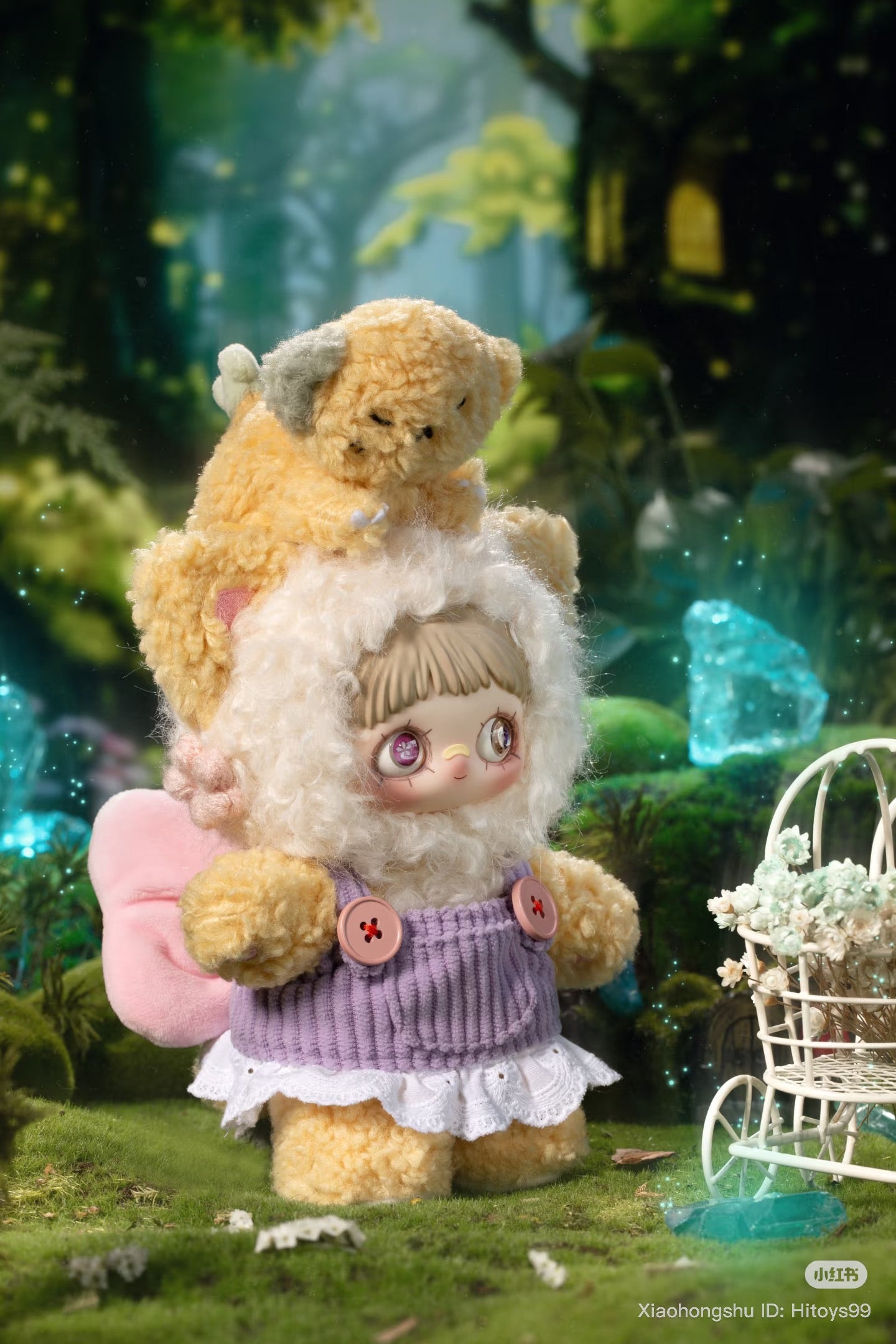 MayMei Symbiote Neverland Series Vinyl Keychain Plush in a whimsical forest, featuring a doll in sheep-like attire with a furry companion atop its head.