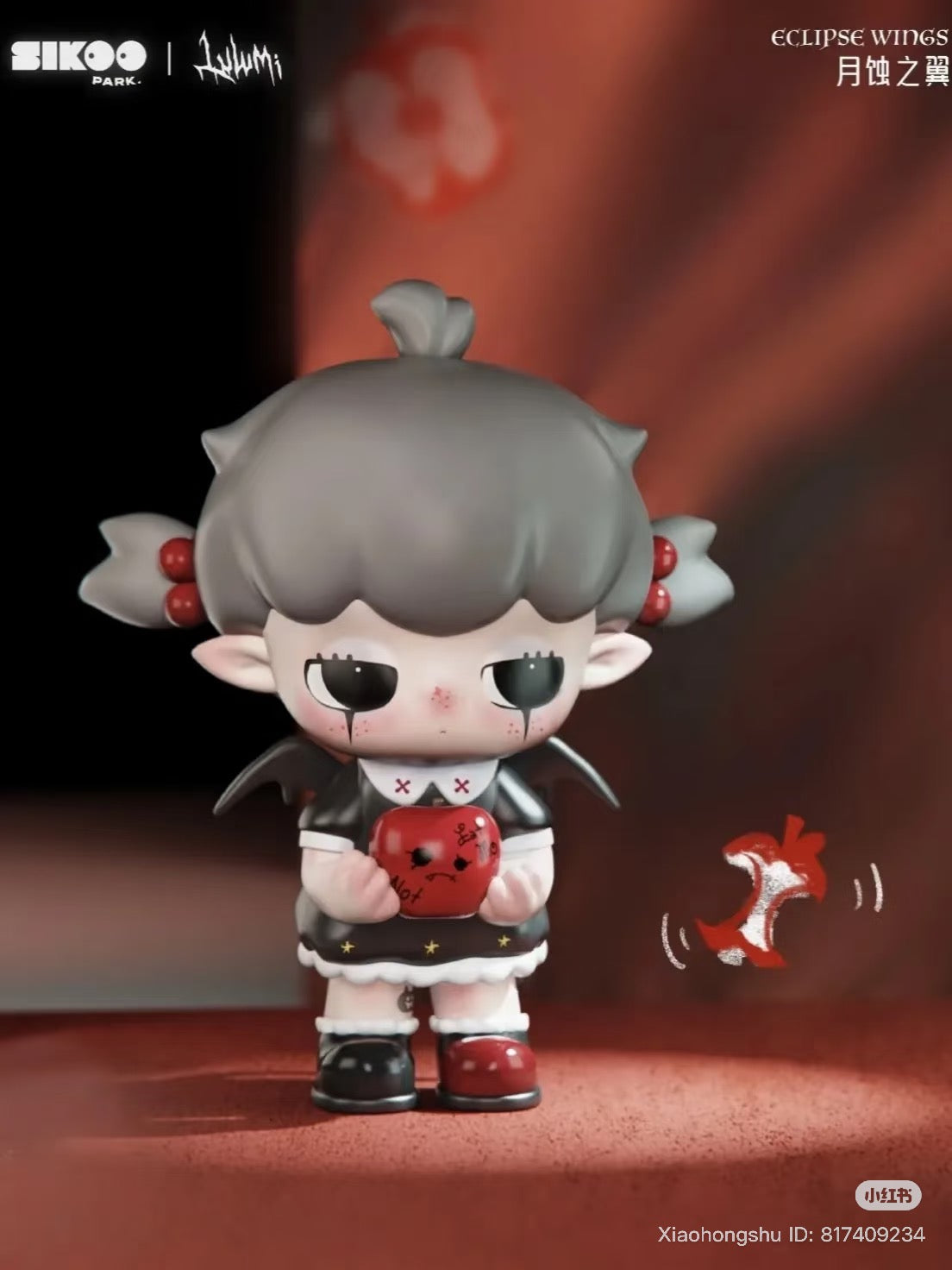 Lulumi The Rift Invitation Series Figure, featuring a girl with bat wings and a bitten apple, part of a collectible blind box series.