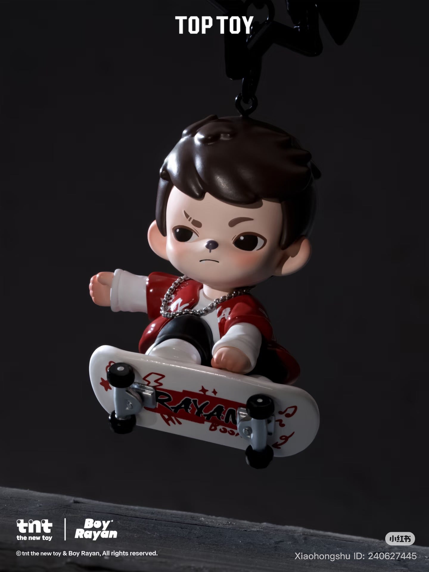 Rayan Love Series Keychain Pendant Blind Box: Vinyl figurine of Boy Rayan on skateboard, red jacket, silver chain, keychain clasp attached.