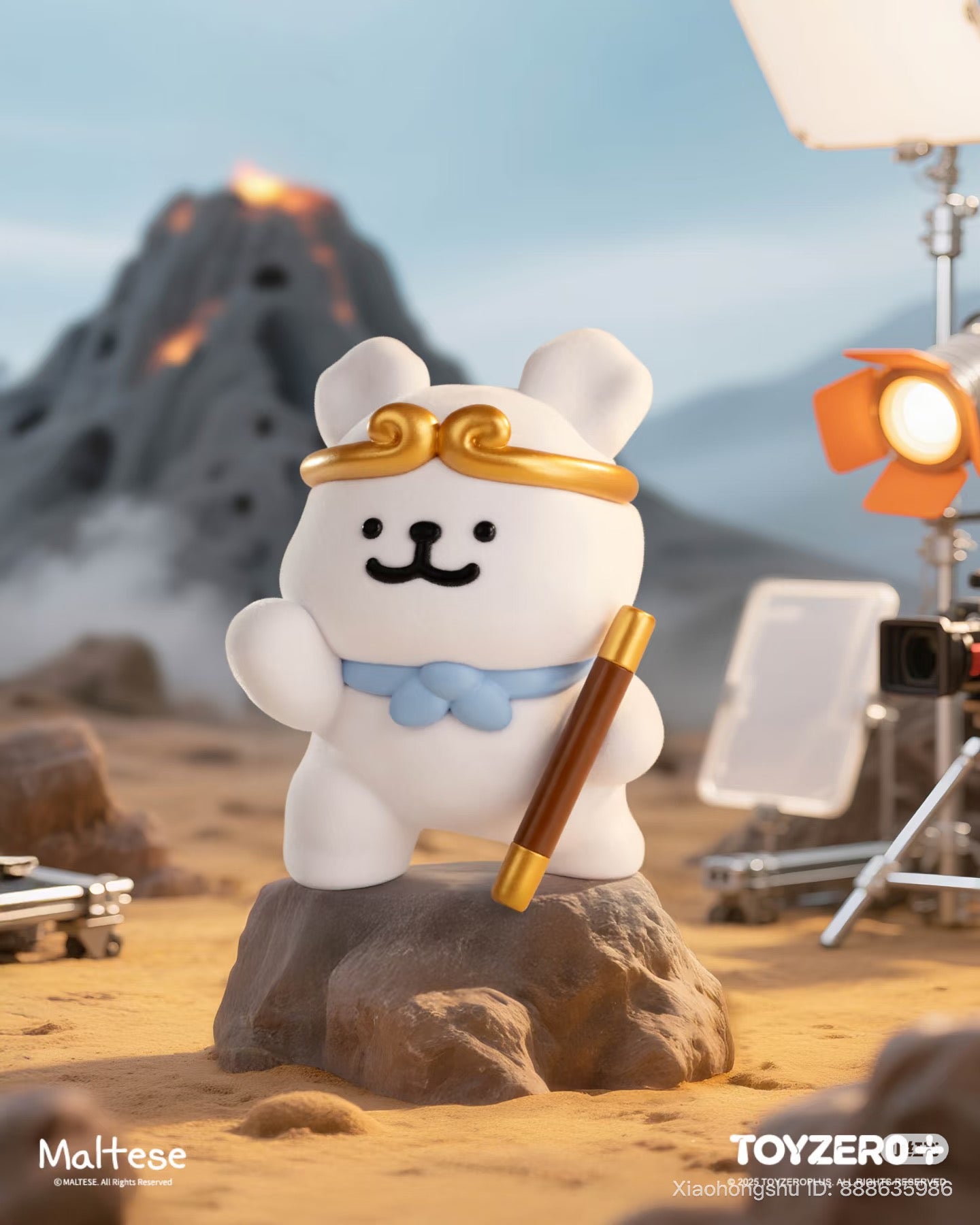 Maltese - Theatre of Life Series Blind Box collectible posed on a rocky set, featuring a gold circlet, blue kerchief, and staff, with a volcano backdrop.