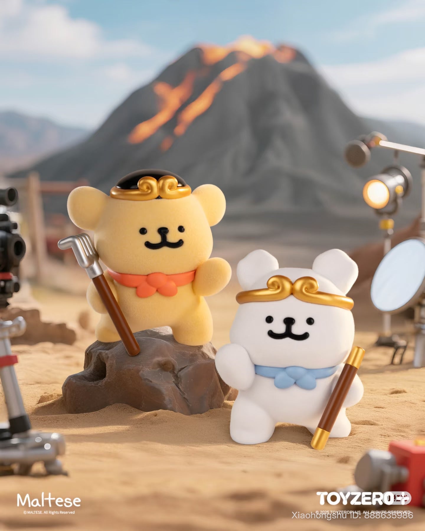 Maltese - Theatre of Life Series Blind Box: Two bear-like figures with headbands and staffs on a desert film set, featuring a volcano and filming equipment.