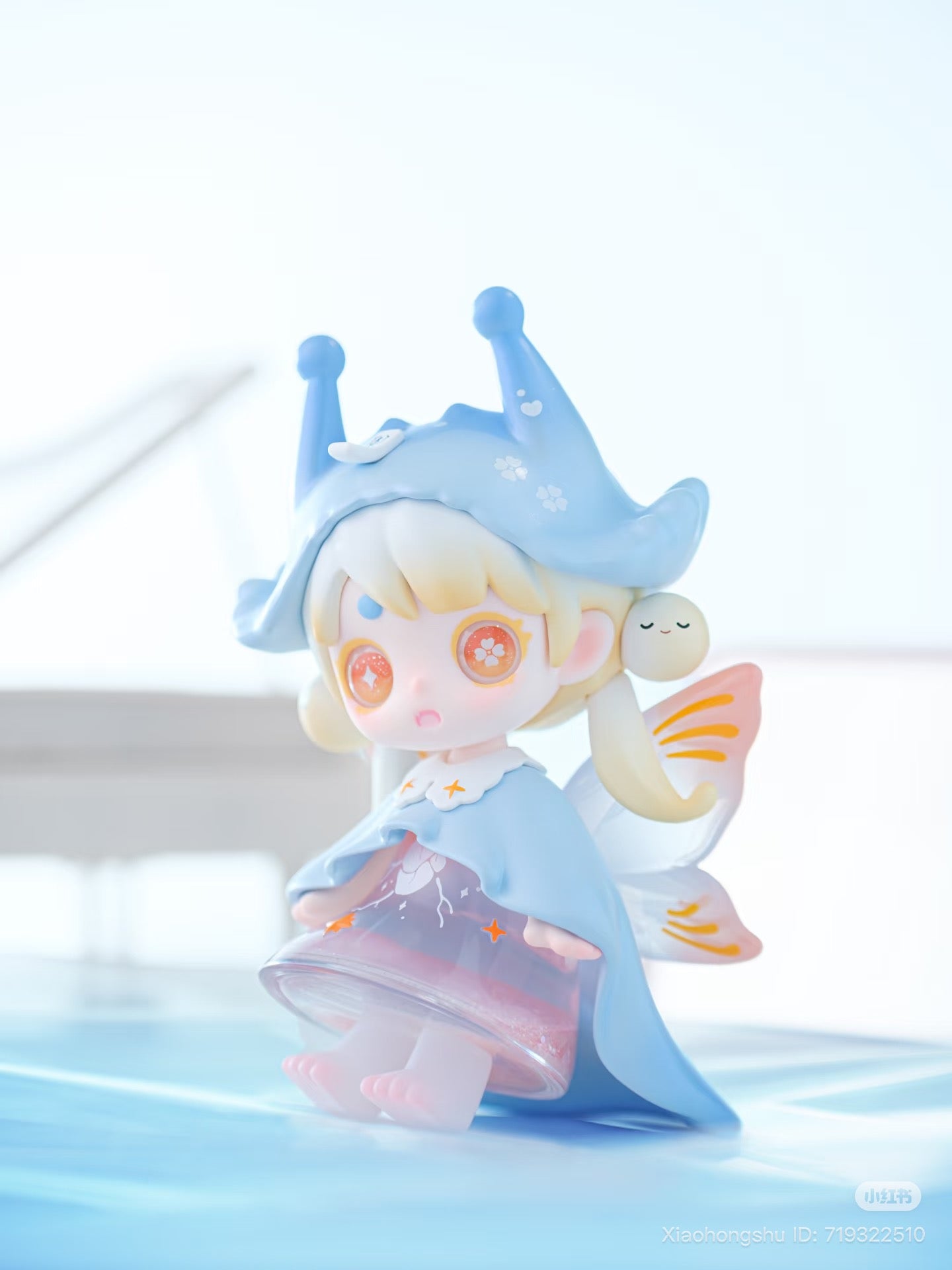 Keeno·Wish On The Sea Breeze figurine: a fairy-like character with butterfly wings, jester hat, glittery skirt, and sparkly eyes. Preorder blind box, Strangecat Toys.