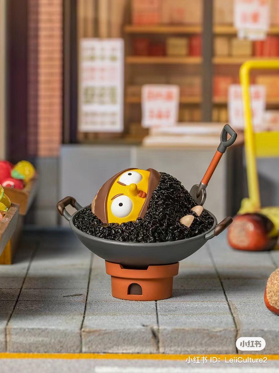 What the Man Daily Blind Box Series toy in a pot with a cartoon character and a shovel, featuring fruit, bowl, and food elements.