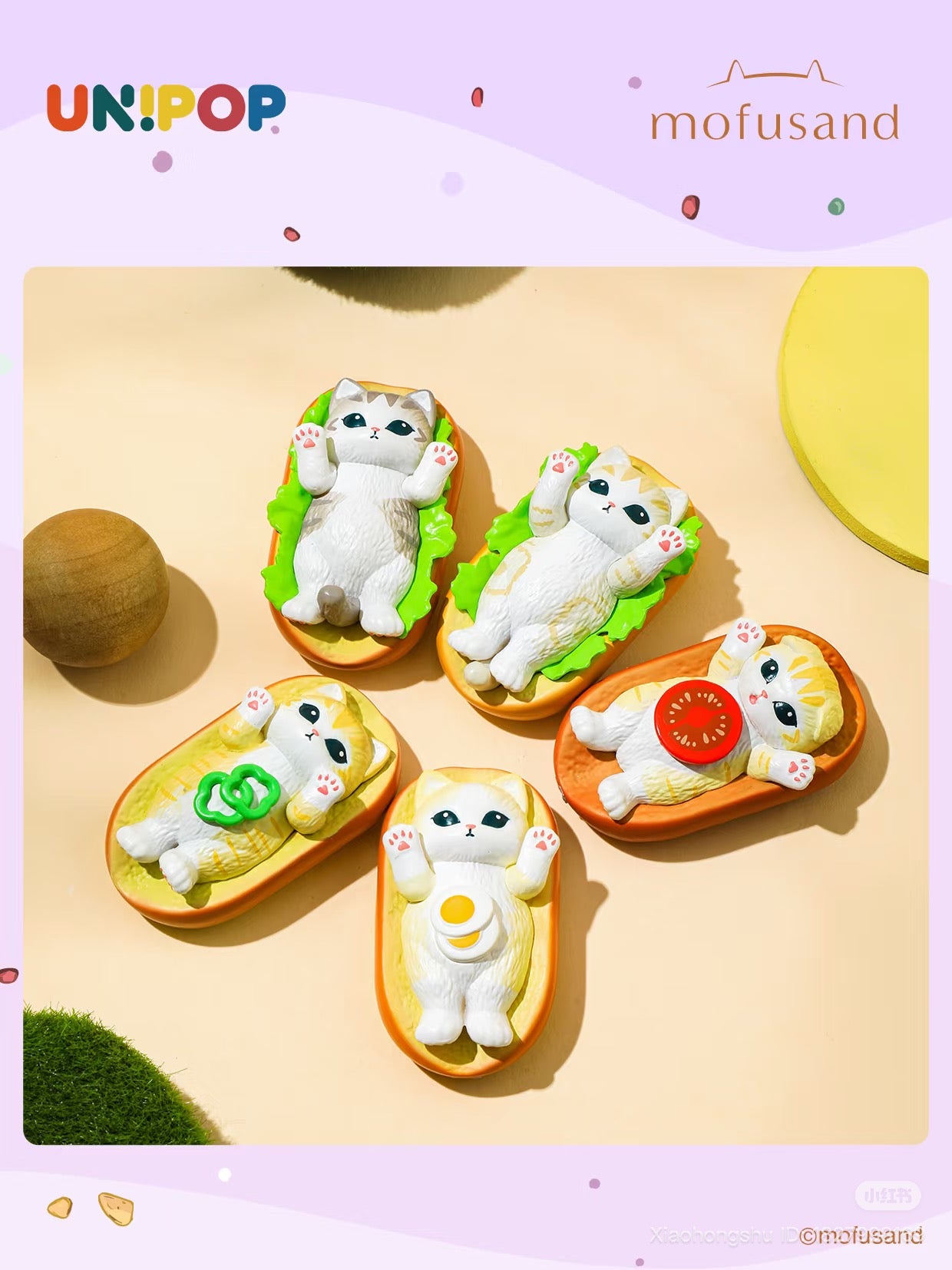 Mofusand Q Mini Blind Bag features playful cat-in-a-bun figurines with various sandwich toppings, part of the Love Dessert Series. Preorder for September 2025 shipping.