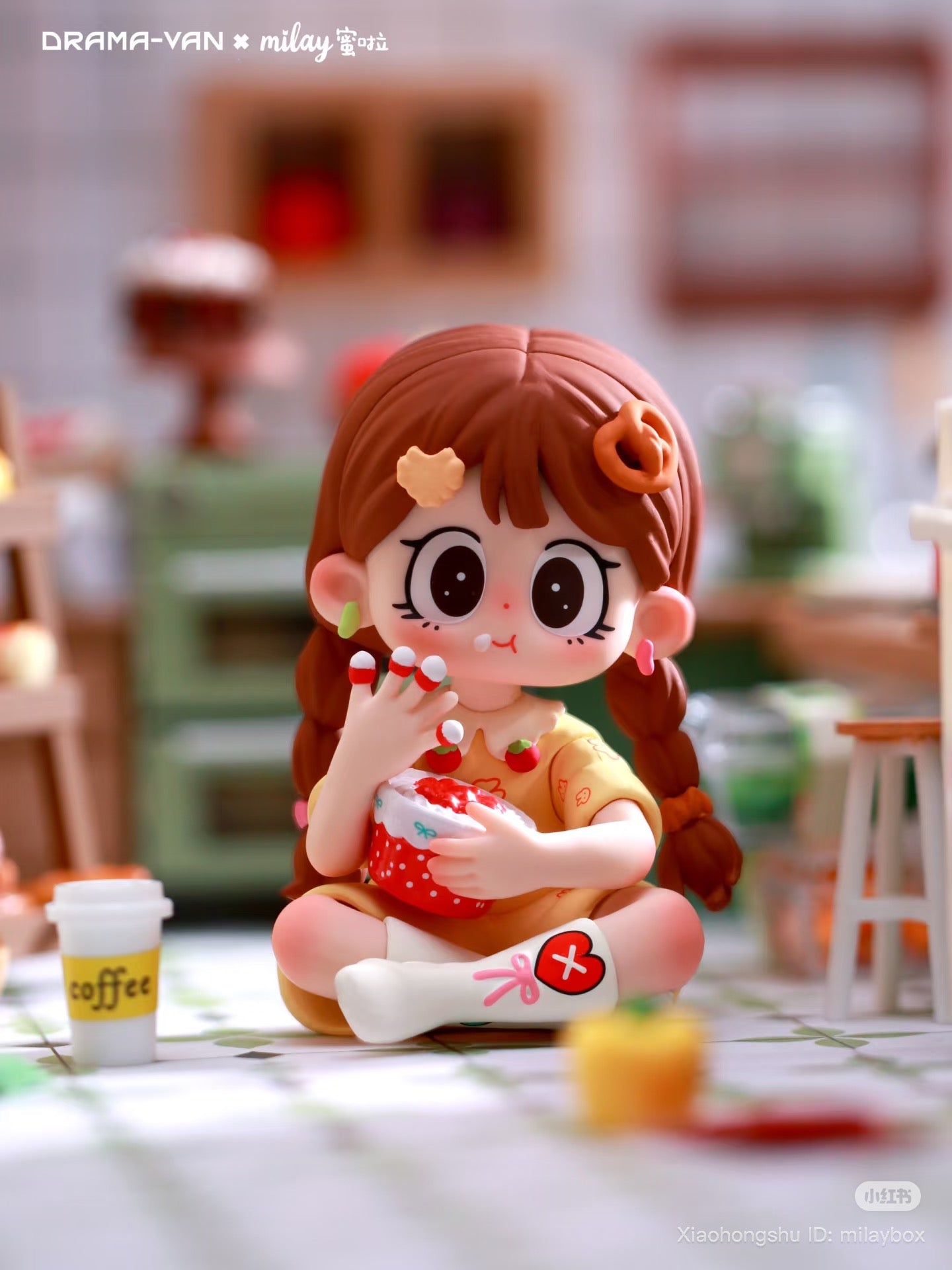 Milay Lazy Time Series Blind Box figurine: chibi girl with braided hair, fruit dress, eating dessert in a miniature kitchen diorama. Preorder available at Strangecat Toys.