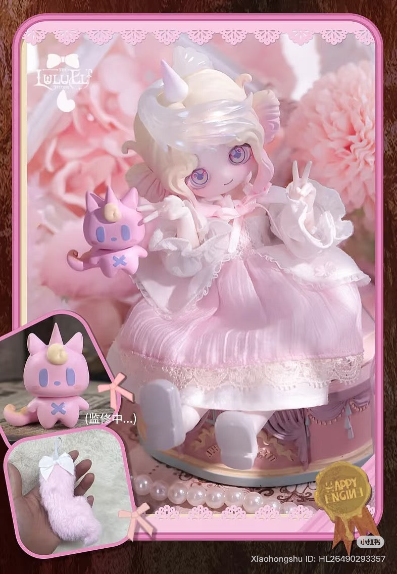 The LULUELF Story Series Articulated Figure Blind Box featuring a pink-dressed doll with unicorn horns, unicorn cat figure, and pink tail keychain.
