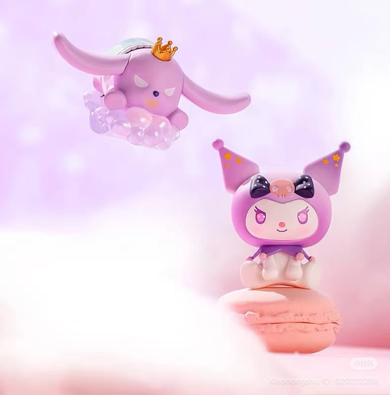 Sanrio Childhood Merry-Go-Round Series Figurine featuring a jester-hat cat on a macaron and a crowned bunny-puppy on a bubble platform.