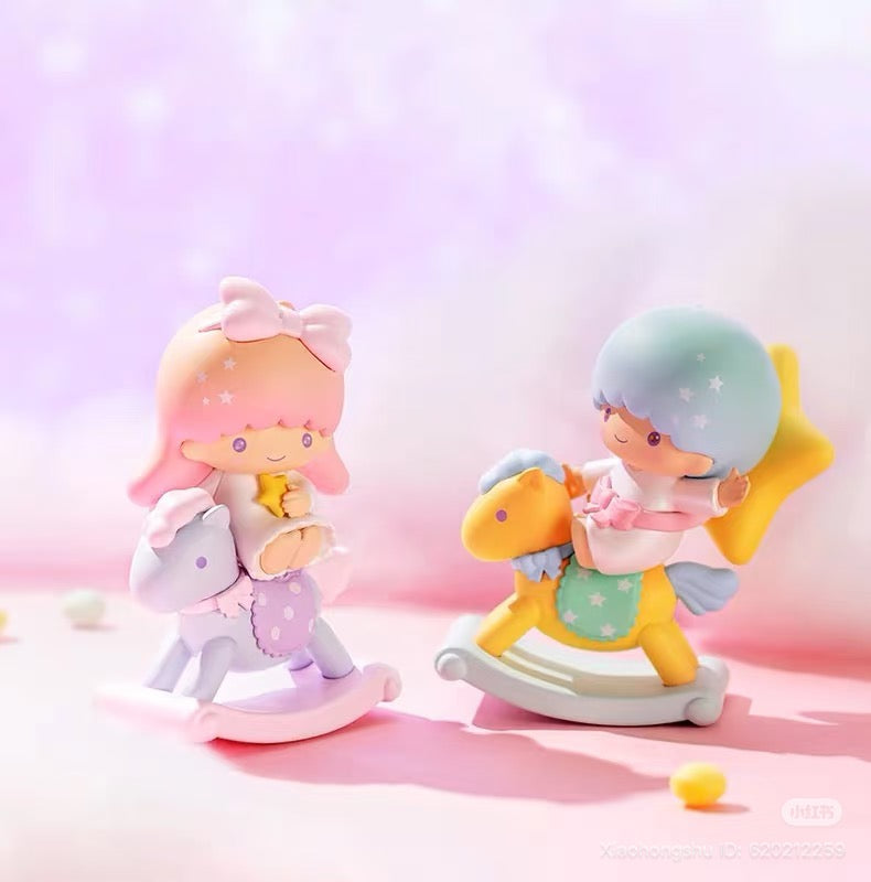 Sanrio Childhood Merry-Go-Round Series Figurine featuring pastel-toned toy figurines with pink and blue hair on rocking-horses, styled in a kawaii design.