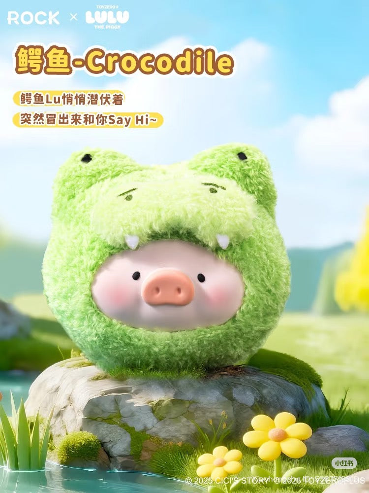 Lulu the Piggy in a crocodile hood sits on a rock, promoting the LuLu the Piggy Animal Party series plush silicone earphone pack blind box.