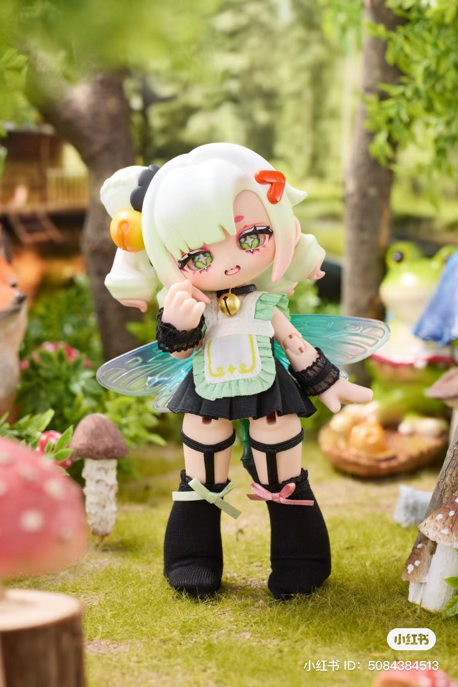 A toy doll and fairy figurine in a garden setting, part of the Kukaka Insect Cafe BJD Blind Box Series.