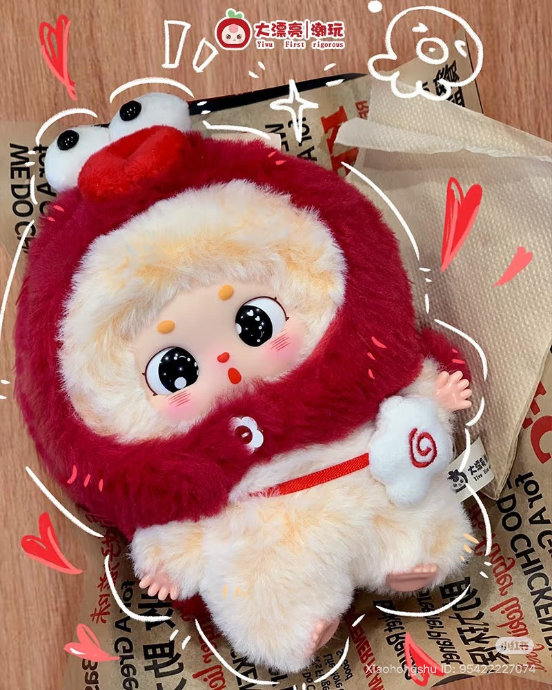 Baby Three - Little Fatty plush with red hood and cartoon face, holding swirl-shaped accessory, sits on a delivery bag. Preorder for October 2025 release.