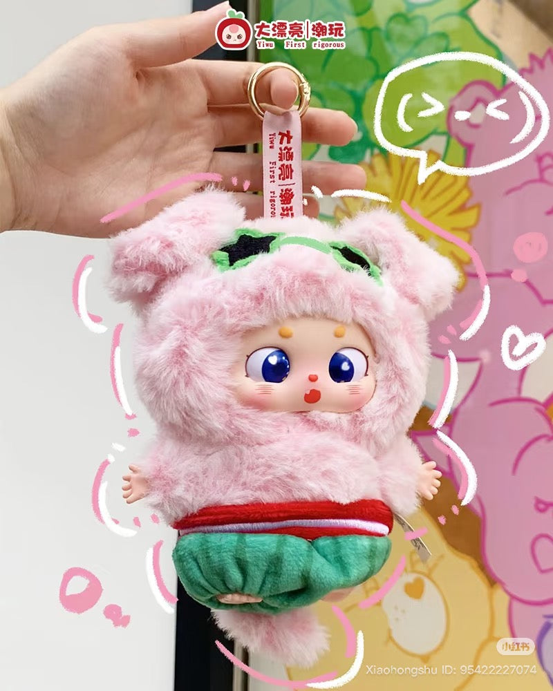 Baby Three - Little Fatty keychain, a plush doll in a pink animal suit with big eyes, blushing cheeks, and gold split-ring for hanging.