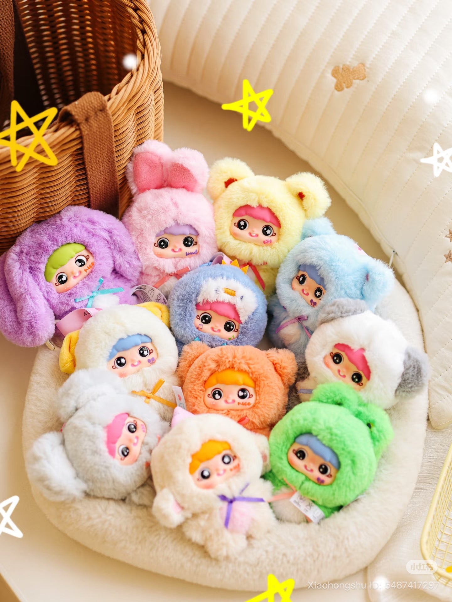Baby Three - YAYA's first birthday plush dolls nestled in a cream bowl, featuring chubby faces with animal-ear hoods, available for preorder.