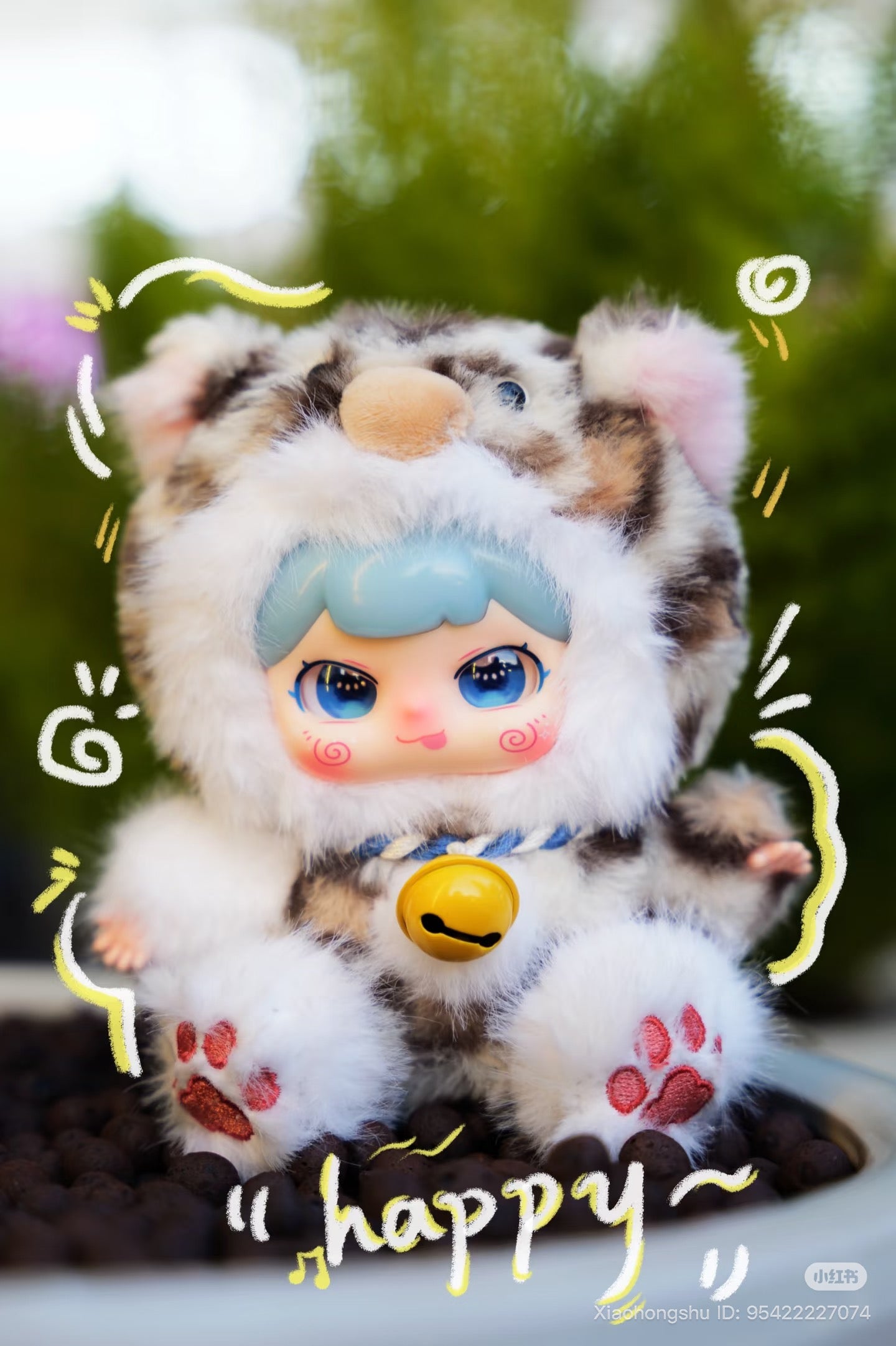 Baby Three - Xiaopaofu-Lucky Bell Plush Blind Box doll in a cat-like onesie with blue hair and eyes, seated on pebbles, pre-order available.