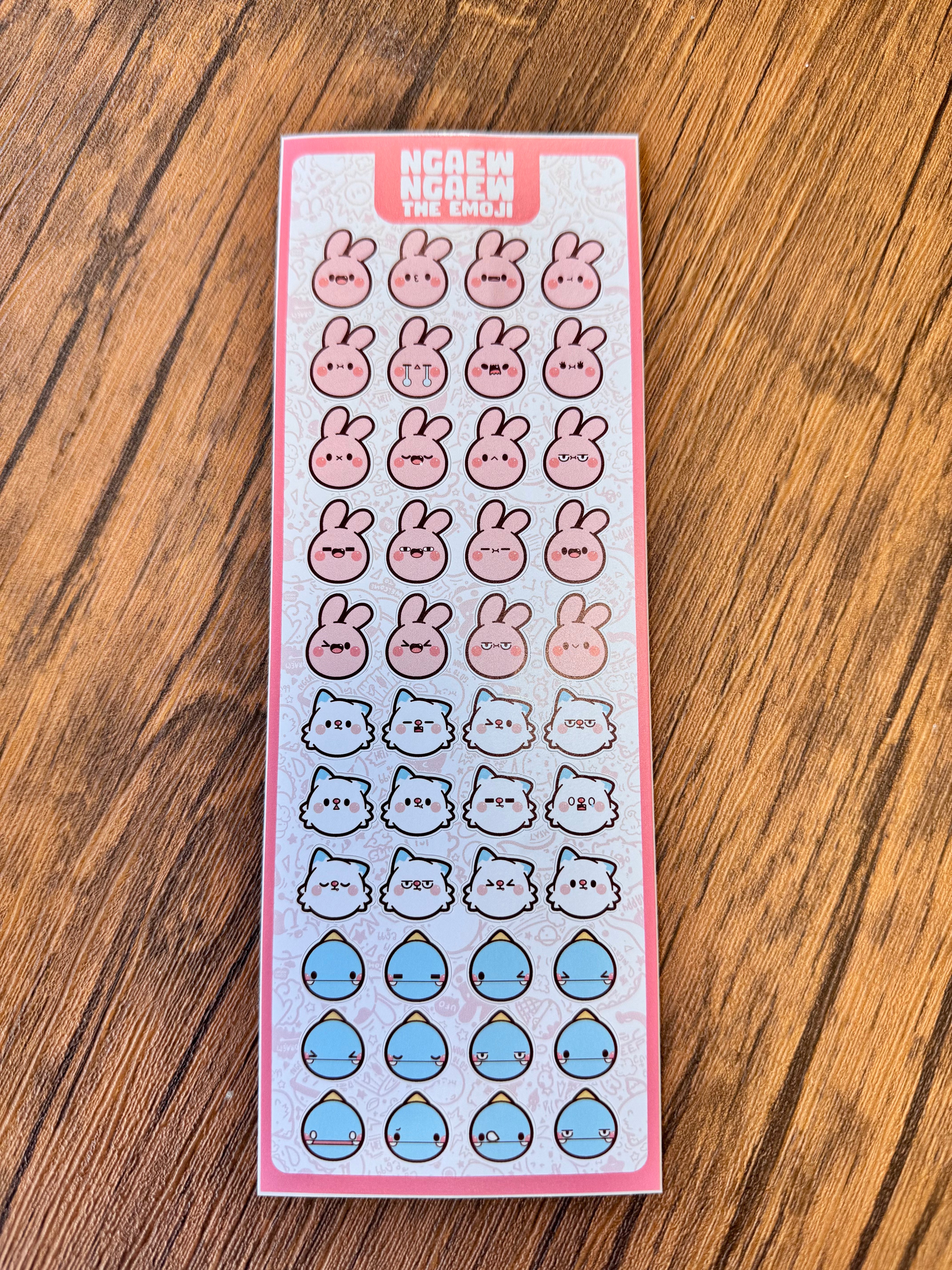 Ngaew Sticker Packs! Series 2! features cute bunny, cat, and teardrop emojis on a sticker sheet, perfect for fans of whimsical, minimalist designs.