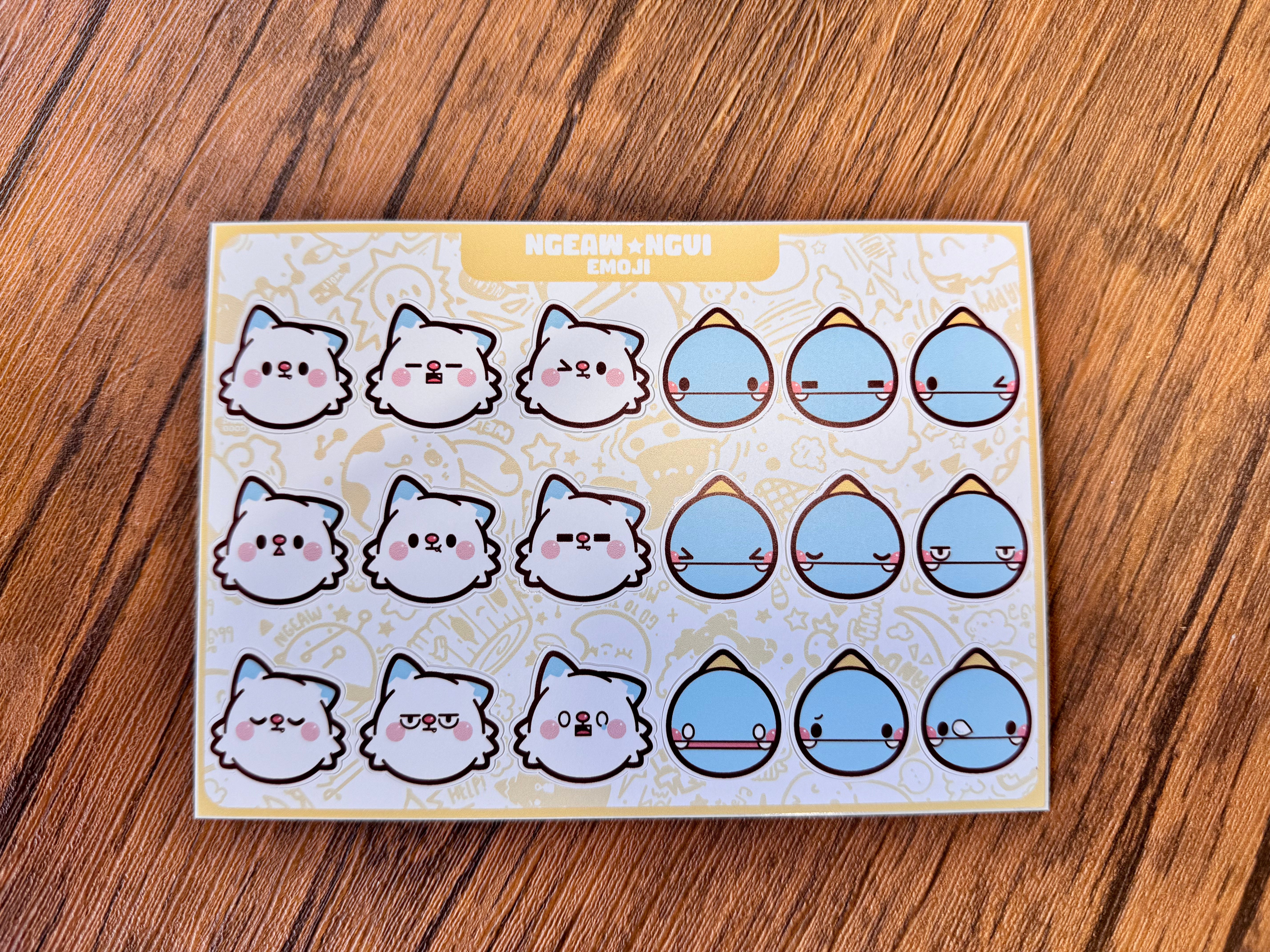 Ngaew Sticker Packs! Series 2! features kawaii cat and teardrop emojis on a sticker sheet, showcasing various playful expressions.