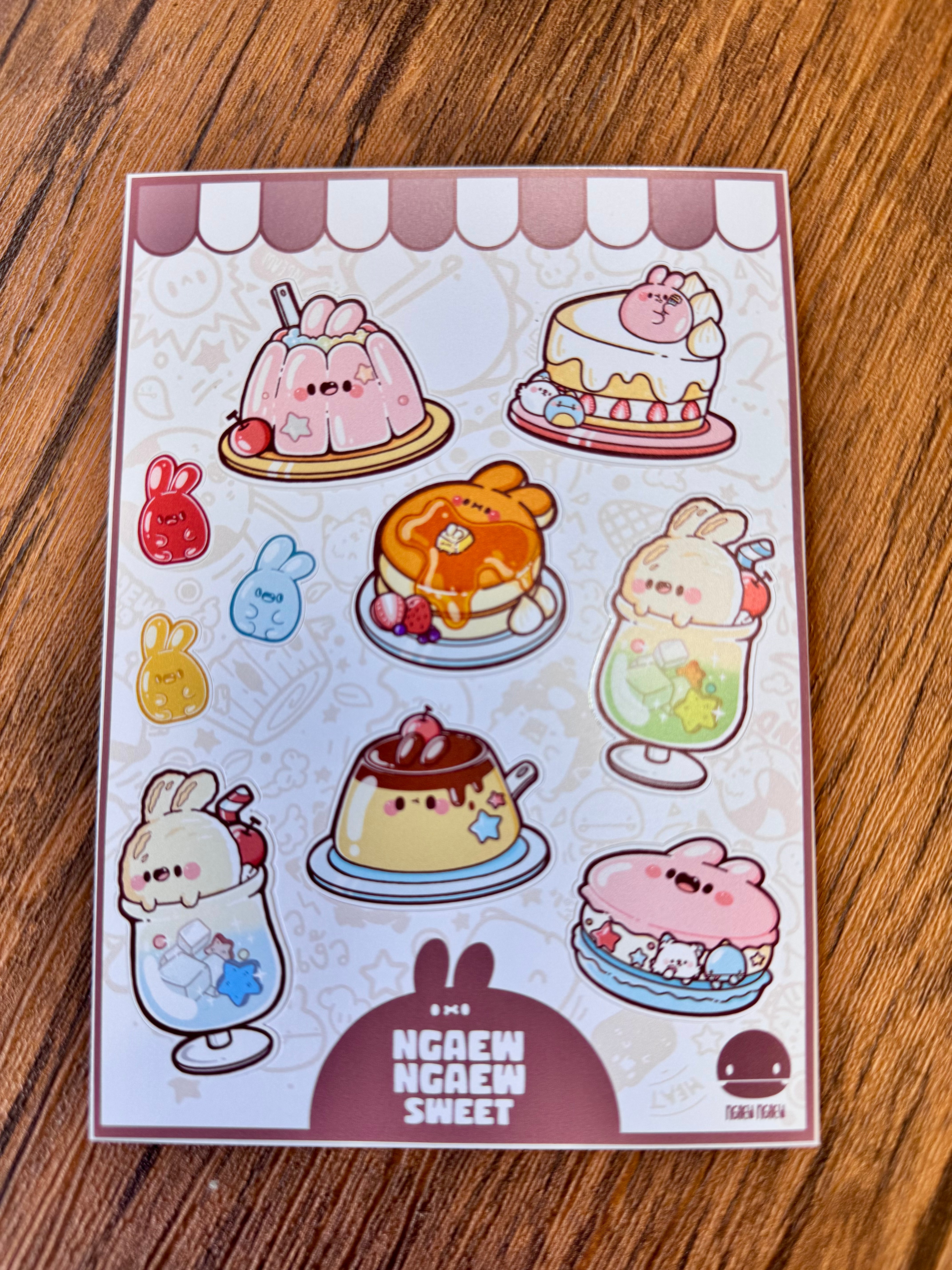 Ngaew Sticker Packs! Series 2 features cute pastel dessert stickers with bunny motifs, perfect for adorning items with charming, whimsical flair.
